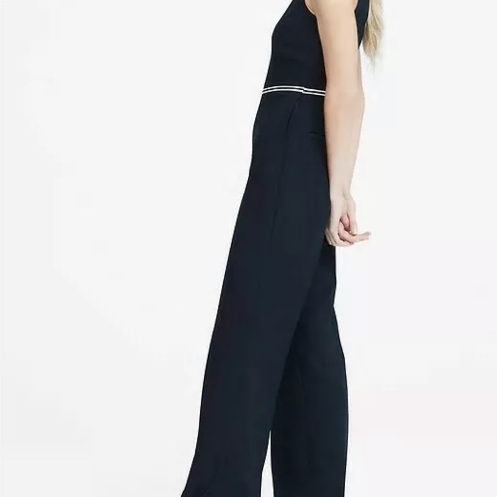 BR Navy jumpsuit with white striped detail.